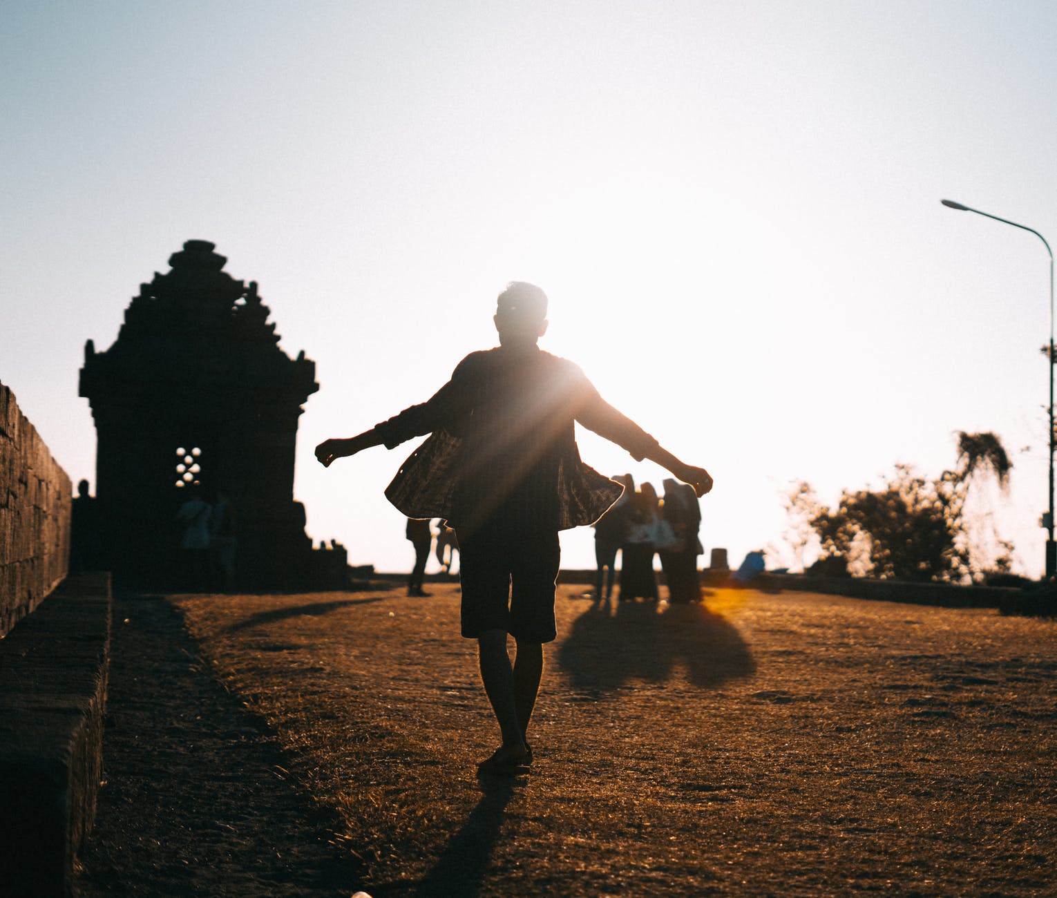 silhouette of person during dusk